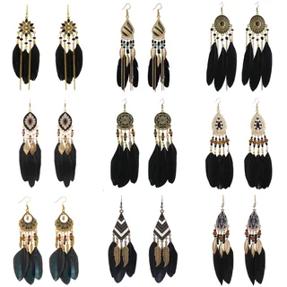 A grid display of various dark-toned feather earrings featuring different metal plates, beads, and black feathers.