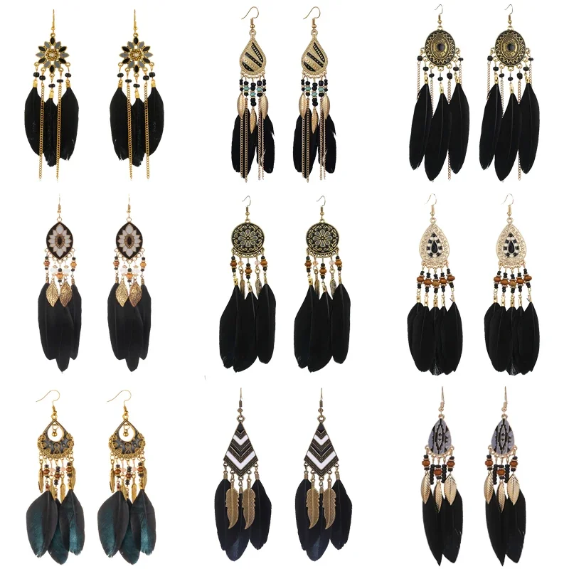 A grid display of various dark-toned feather earrings featuring different metal plates, beads, and black feathers.