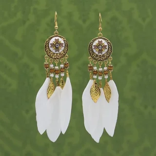 Drop earrings featuring a central floral motif, beaded strands, and white soft feathers.