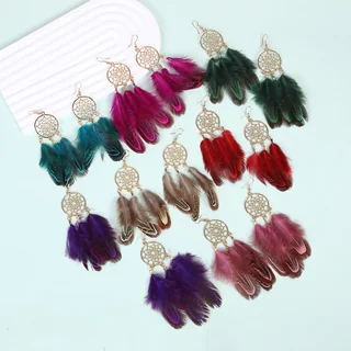 A selection of Daydream Feather Drops in various colors, each with a metal webbed circle and three dangling feathers.