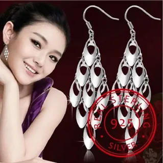 Silver-toned drop earrings featuring multiple overlapping teardrop-shaped metal links, hanging from a standard hook wire.