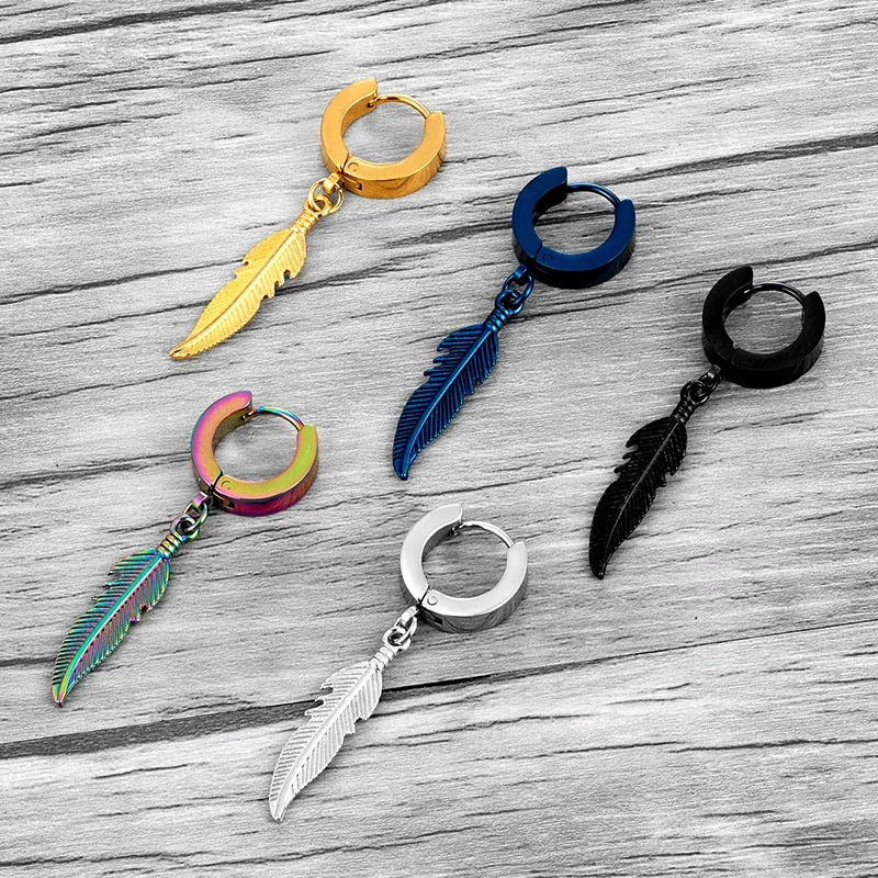 A selection of small metal hoop earrings, each with a single hanging feather-shaped charm, shown in various metallic finishes.