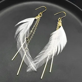Two drop earrings featuring a single white plume, a fine chain, and a long, thin metallic bar.